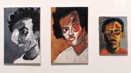 Wiji Thukul dan aktivis HAM Munir Thalib dalam sketsa warna karya Dewi Candraningrum dalam pameran di Yogyakarta, Maret 2015. Foto oleh Ari Susanto/Rappler.com