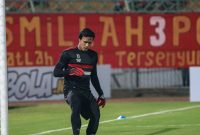 Kiper Madura United Muhammad Ridho latihan pemanasan jelang laga Madura United Vs Persela, di Stadion Gelora Bangkalan, Jawa Timur, Selasa, 24/09/2019. (istimewa)
