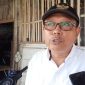 Mukhlisin, mantan Pj. Kades Putatkumpul, Kecamatan Turi, Lamongan ditemui awak media. (SJ Foto)