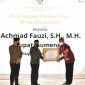 Foto: Bupati Sumenep, Achmad Fauzi Menerima Penghargaan dari kementrian PDTT. 