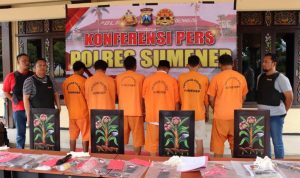 Tersangka penculikan asal Bangkalan didampingi anggota resmob polres sumenep