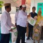 Foto:Penyaluran Bansos di balai desa Nonggunong