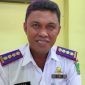 TERSENYUM: Kepala Dinas Perikanan Kabupaten Sumenep, Agustiono Sulasno.