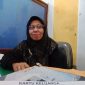 MENJELASKAN: Kepala Bidang Pelayanan Pendaftaran Penduduk, Kabupaten Sumenep, Wahasah, saat ditemui di kantornya (SandiGT - Seputar Jatim)