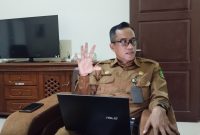 BERKACAMATA: Kepala Badan Riset dan Inovasi Daerah Kabupaten Sumenep 2025, Benny Irawan, saat menjelaskan inovasi daerah 2025 (SandiGT - Seputar Jatim)