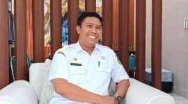 TERSENYUM: Kepala Disnaker Sumenep, Heru Susanto (Doc. Seputar Jatim)