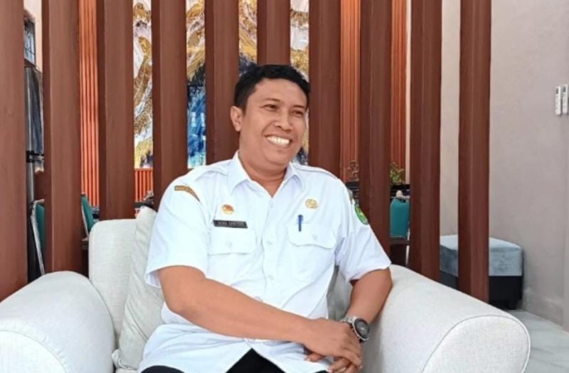 TERSENYUM: Kepala Disnaker Sumenep, Heru Susanto (Doc. Seputar Jatim)