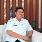 TERSENYUM: Kepala Disnaker Sumenep, Heru Susanto (Doc. Seputar Jatim)