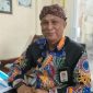 TERSENYUM: Kepala Disbudporapar Sumenep, Moh. Iksan, saat ditemui di ruang kerjanya (Doc. Seputar Jatim)