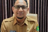 TERSENYUM: Kepala Disdik Sumenep Agus Dwi Saputra (Doc. Seputar Jatim)