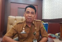 WIBAWA: Kepala DPMD Sumenep, Anwar Syahroni Yusuf, saat ditemui wartawan di ruang kerjanya (SandiGT - Seputar Jatim)