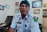 TEGAS: Kepala Disbudporapar Sumenep, Moh. Iksan, saat ditemui di ruangan kerjanya (SandiGT - Seputar Jatim)
