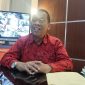 TERSENYUM : Kepala DKPP Sumenep, Chainur Rasyid saat ditemui di ruang kerjanya (SandiGT - Seputar Jatim)