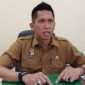 MENJELASKAN : Kabag Perekonomian dan SDA Setkab Sumenep, Dadang Dedy Iskandar saat ditemui di ruang kerjanya (sandiGT - Seputar Jatim)