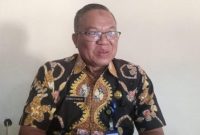 PAKAI BATIK: Kepala Bidang P2P Dinkes P2KB Sumenep, Ahmad Syamsuri saat memaparkan angka kasus stroke (istimewa)