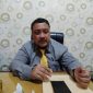 MENJELASKAN: Kepala Bakesbangpol Sumenep Ach. Dzulkarnain, saat ditemui di ruangannya (SandiGT - Seputar Jatim)