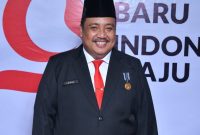 TERSENYUM: Kepala Bakesbangpol Sumenep, Dzulkarnain (SandiGT - Seputar Jatim)