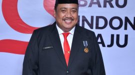 TERSENYUM: Kepala Bakesbangpol Sumenep, Dzulkarnain (SandiGT - Seputar Jatim)