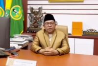 BERPECI: Rektor UNIBA Madura, Rahmat Hidayat, saat berada di ruang kantornya (SandiGT - Seputar Jatim)