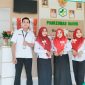 SEMANGAT: Tim Pegawai Puskesmas Dasuk memakai Pernak pernik Merah Putih dengan semangat Kemerdekaan selama Bulan Agustus 2025 (Doc. Seputar Jatim)