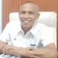 TERSENYUM: Kepala Dispusip Sumenep, Rudi Yuyianto (Doc. Seputar Jatim)