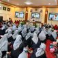 KHIDMAT: Suasana ratusan ASN, Non ASN, serta DWP dan seluruh jajan Bappeda dan BKPSDM saat menggelar acara maulid Nabi Muhammad SAW (SandiGT - Seputar Jatim) 