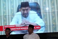 VIDEOTRON: Bupati Sumenep, Achmad Fauzi Wongsojudo saat memberikan sambutan secara virtual pada acara Deklarasi Gerakan Bahaya Judi Online di Aula Kominfo Sumenep (Doc. Seputar Jatim)