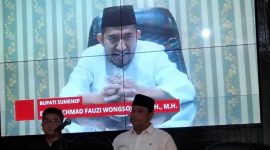 VIDEOTRON: Bupati Sumenep, Achmad Fauzi Wongsojudo saat memberikan sambutan secara virtual pada acara Deklarasi Gerakan Bahaya Judi Online di Aula Kominfo Sumenep (Doc. Seputar Jatim)