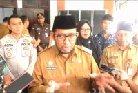 TEGAS: Bupati Sumenep, Achmad Fauzi Wongsojudo, bersama Kepala Dinas Sosial Sumenep, Mustangin, usai meresmikan Sekolah Rakyat (SandiGT - Seputar Jatim) 