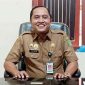 TERSENYUM: Kepala Bapenda Sumenep, Faruk Hanafi, saat menyampaikan tentang capaian PAD yang melampaui target (Doc. Seputar Jatim)