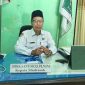 BERWIBAWA: Kepala MTsN 3 Saronggi, Didik Santoso, saat ditemui di ruang kerjanya (Mufti Che - Seputar Jatim)