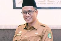 TERSENYUM: Kepala BKPSDM Kabupaten Sumenep, Benny Irawan (Doc. Seputar Jatim)