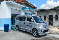 CERAH: Mobil SPPG Talang saat akan mengantar MBG ke sekolah (Mufti Che - Seputar Jatim)