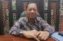 TERSENYUM: Kepala DKPP Sumenep, Chainur Rasyid, saat ditemui di kantornya (SandiGT - Seputar Jatim)