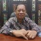 TERSENYUM: Kepala DKPP Sumenep, Chainur Rasyid, saat ditemui di kantornya (SandiGT - Seputar Jatim)