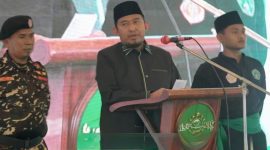 TEGAS: Bupati Sumenep, Achmad Fauzi Wongsojudo saat memberikan sambutan dalam acara Pelantikan PCNU Sumenep Masa Khidmat 2026–2031 di Pondok Pesantren Al-Karimiyyah Braji, Sumenep (Doc. Seputar Jatim)