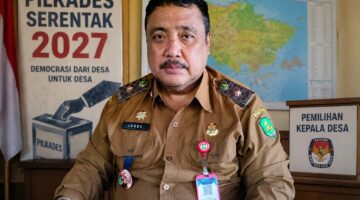 GAGAH: Kepala DPMD Sumenep, Achmad Dzulkarnain, saat memberikan keterangan terkait persiapan Pemilihan Kepala Desa (Pilkades) Serentak 2027 yang akan diikuti 246 desa di Kabupaten Sumenep (Doc. Seputar Jatim)
