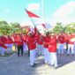 KOMPAK: Bupati Sumenep, Achmad Fauzi Wongosjudo (kiri) bersama Wabup Sumenep, Imam Hasyim (kanan) saat mengibarkan Bendera Merah Putih sebagai tanda menyambut HUT ke 81 RI (Doc. Seputar Jatin)