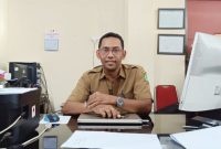 TERSENYUM: Sekretaris Disperkimhub Sumenep, Agus Adi Hidayat (Foto Istimewa)