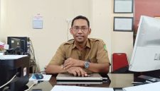 TERSENYUM: Sekretaris Disperkimhub Sumenep, Agus Adi Hidayat (Foto Istimewa)